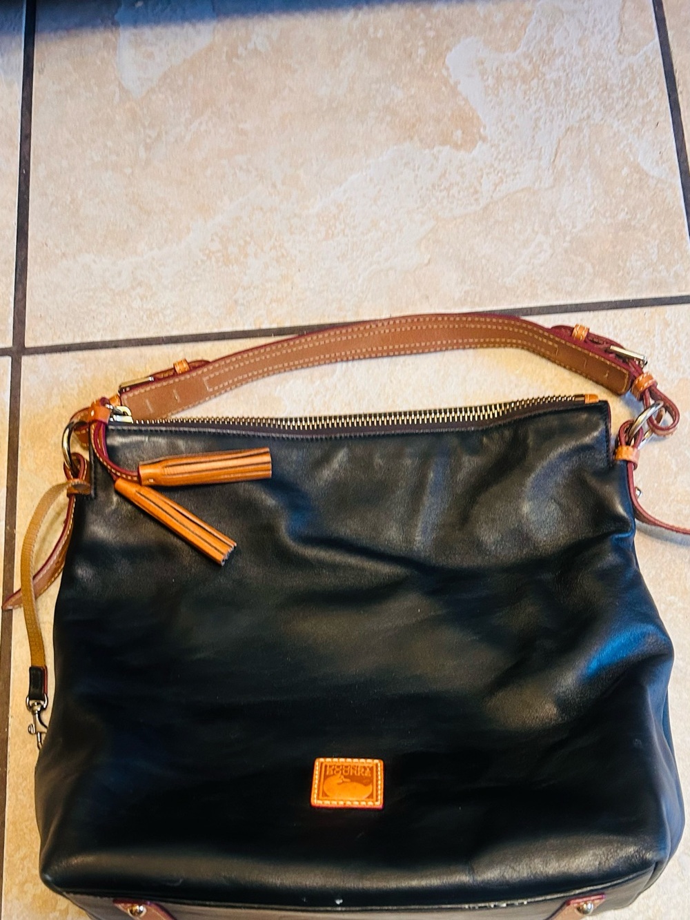 Dooney & Bourke Black Leather Shoulder Bag with Tan Trim. 15x13x5 inches. New.